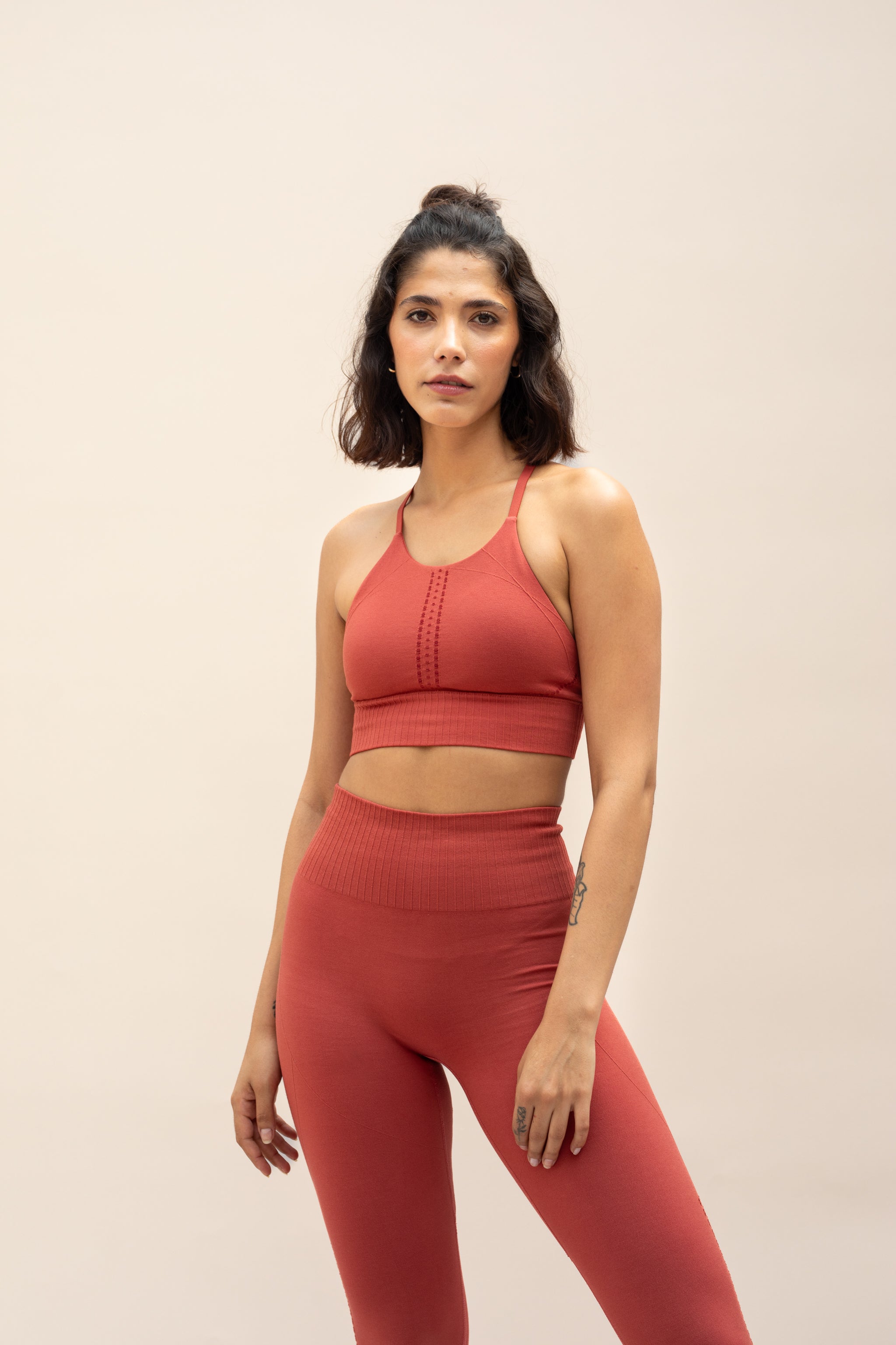 Red orange supportive cropped modal bra and red orange yoga leggings from sustainable women's activewear brand, Jilla.