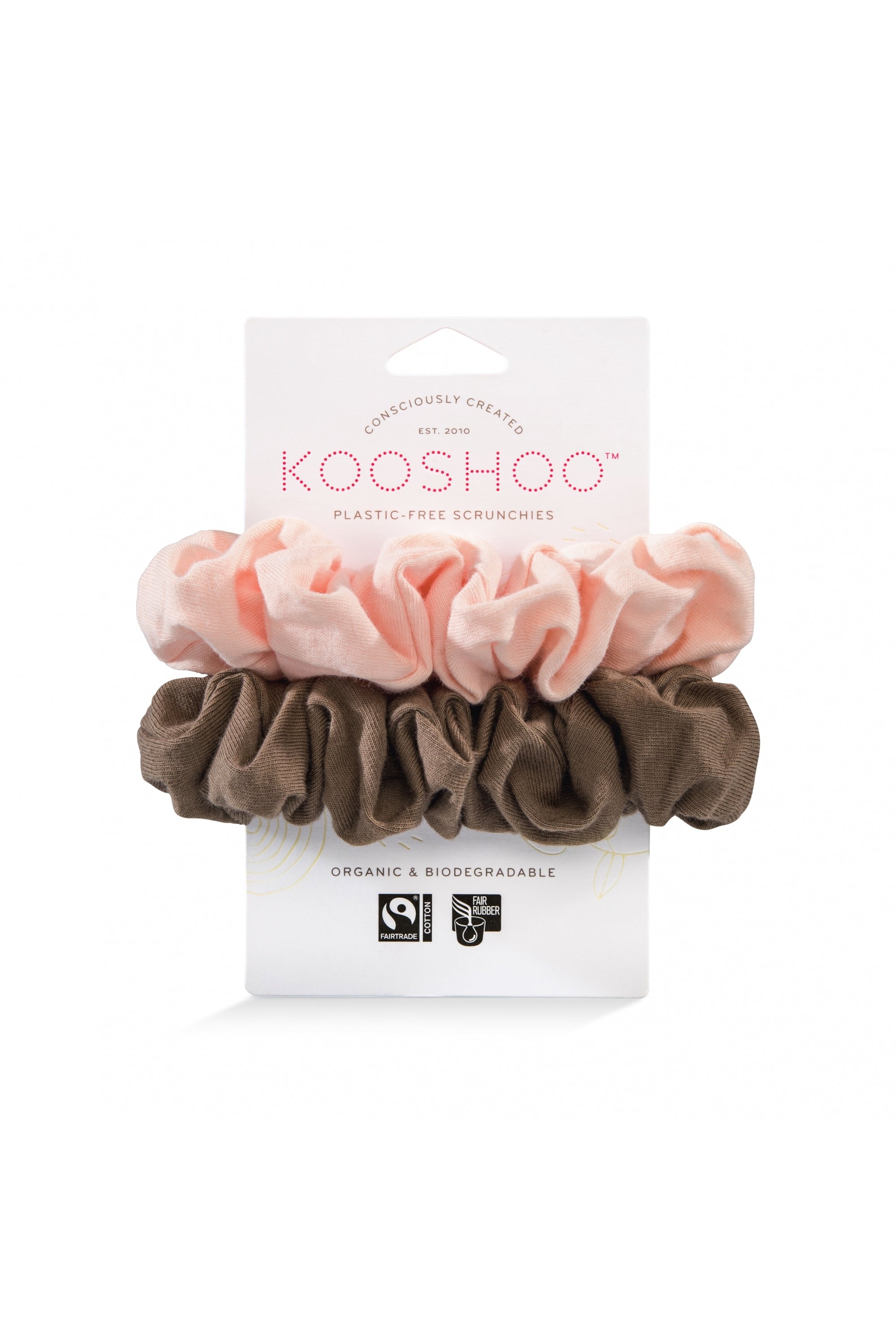 Modern eco-friendly scrunchies with an '80s nod. Made from 100% fair trade, biodegradable materials. Soft organic cotton exterior, plastic-free inner elastic for comfortable, secure hold. Stylish and sustainable accessory in white and beige, suitable from workouts to outings.