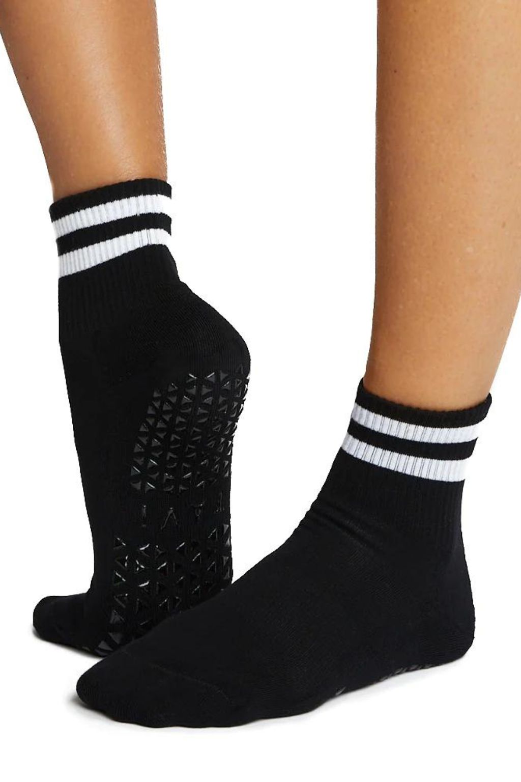 High density black rubber grip activewear socks for yoga, pilates, gym, and exercise from Tavi featured by sustainable women's activewear brand Jilla Active   