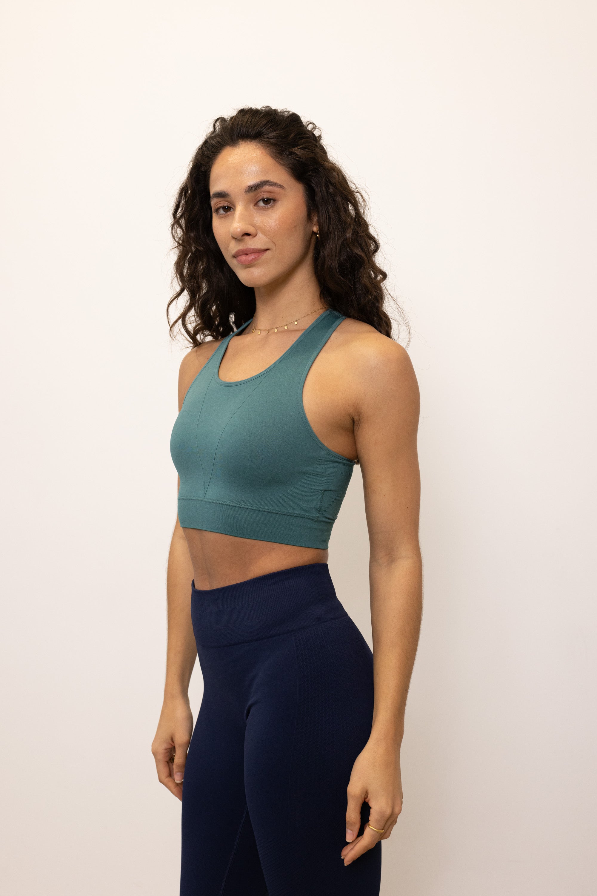 Light emerald blue low to medium support supportive sweat wicking recycled sports bra for yoga, pilates cycling, gym and exercise by sustainable activewear brand, Jilla Active