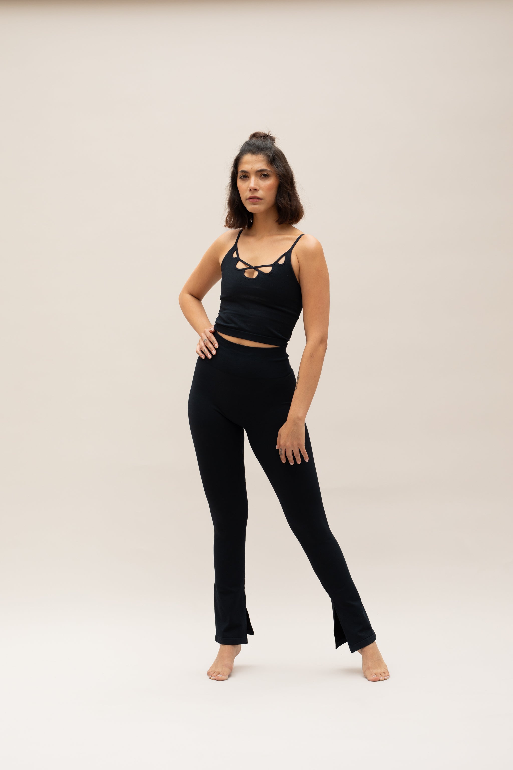Model wearing black top and black leggings for sustainable activewear Jilla