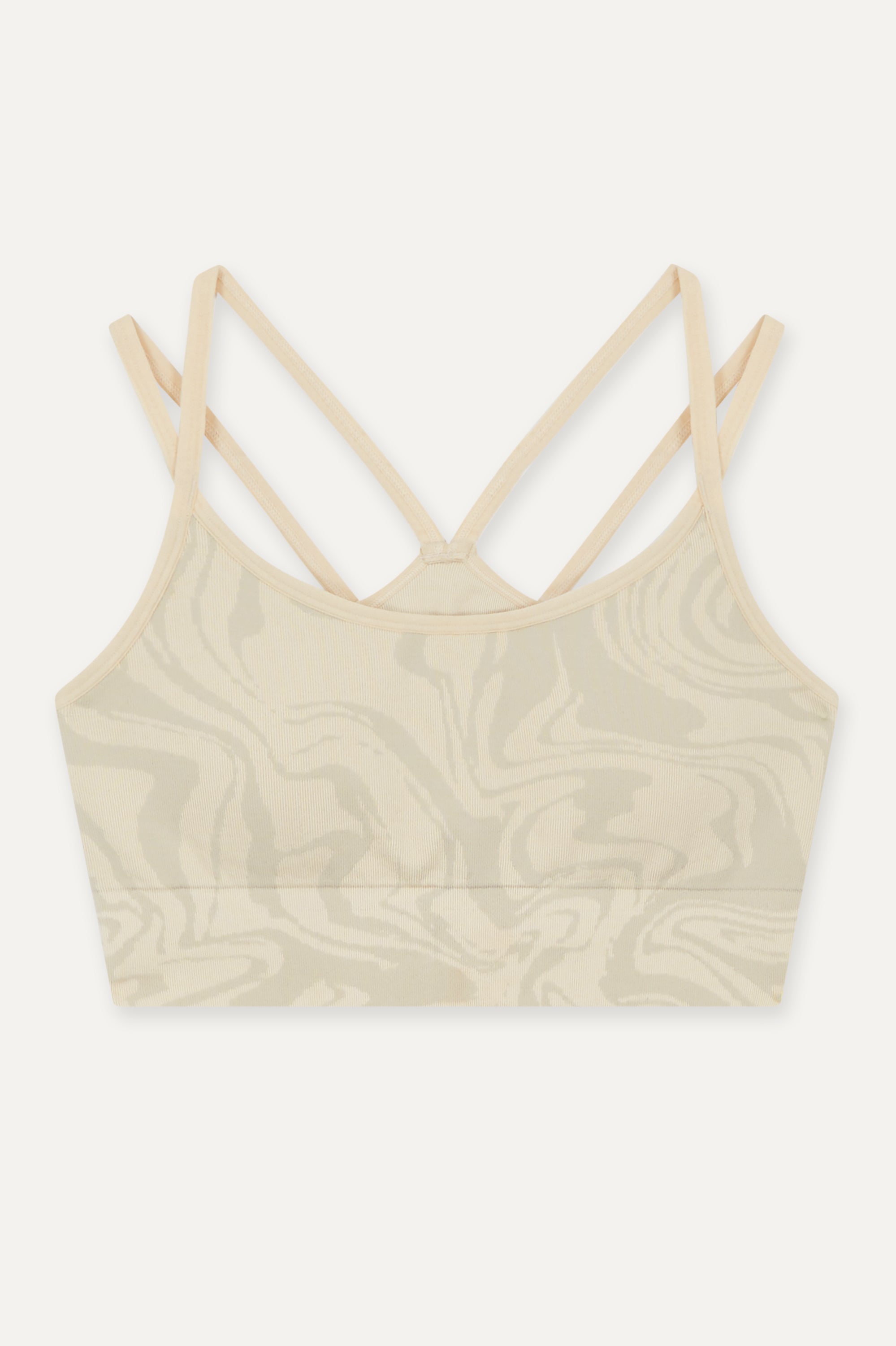 Light beige off white recycled seamless marble print low to medium impact supportive sports bra for yoga, pilates, spinning, weights, running and exercise by sustainable activewear brand Jilla Active
