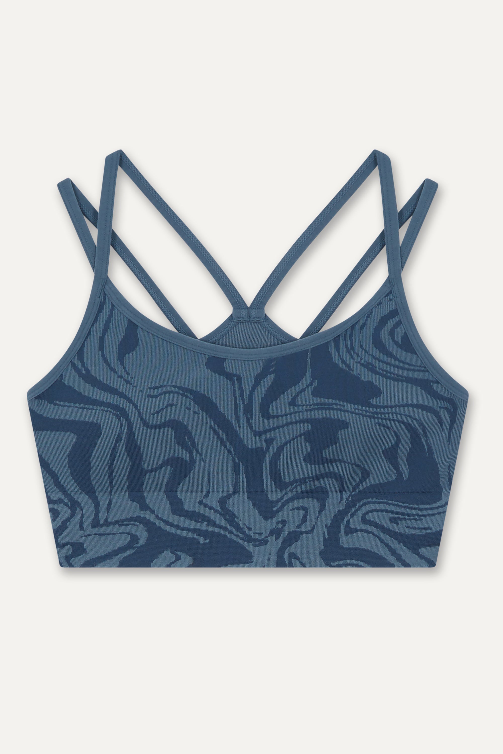 Denim blue recycled seamless marble print low to medium impact supportive sports bra for yoga, pilates, spinning, weights, running and exercise by sustainable activewear brand Jilla Active