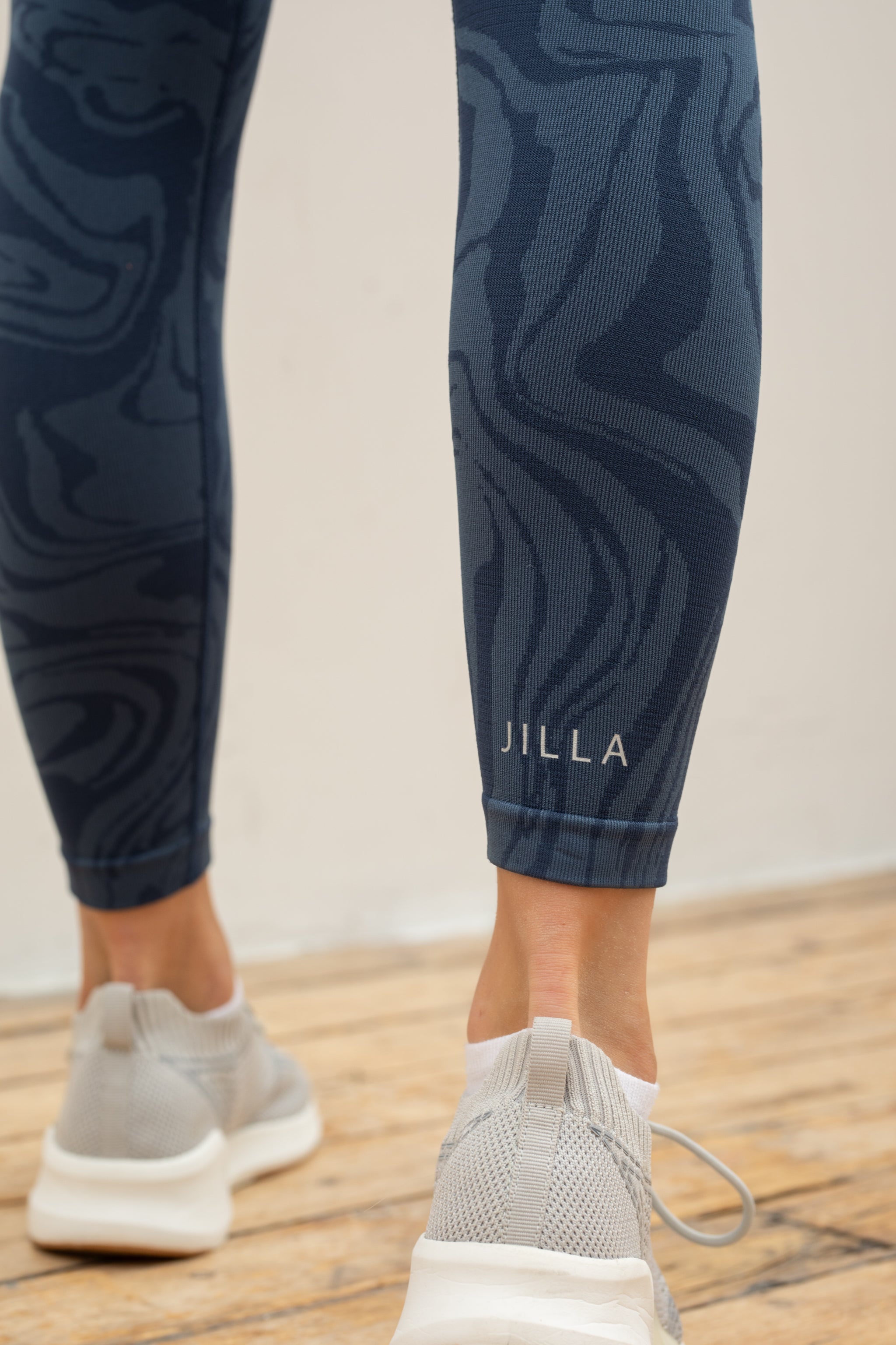 Denim blue recycled seamless marble jacquard print full length high rise sculpting compressive leggings for yoga, pilates, barre, spinning, running, cycling and exercise by sustainable activewear brand Jilla Active