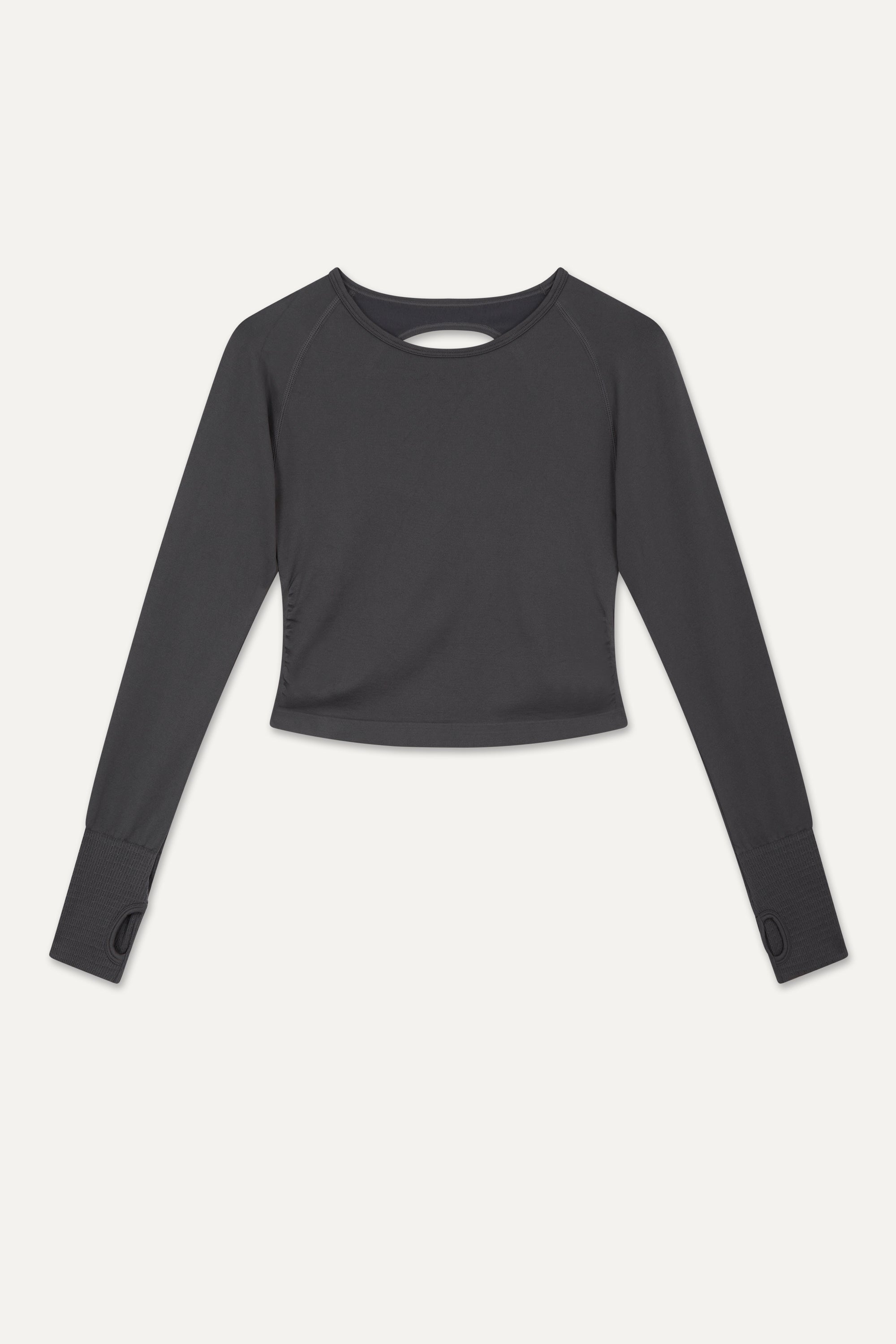 Black long sleeve recycled crop top with black leggings from sustainable women's activewear brand, Jilla.