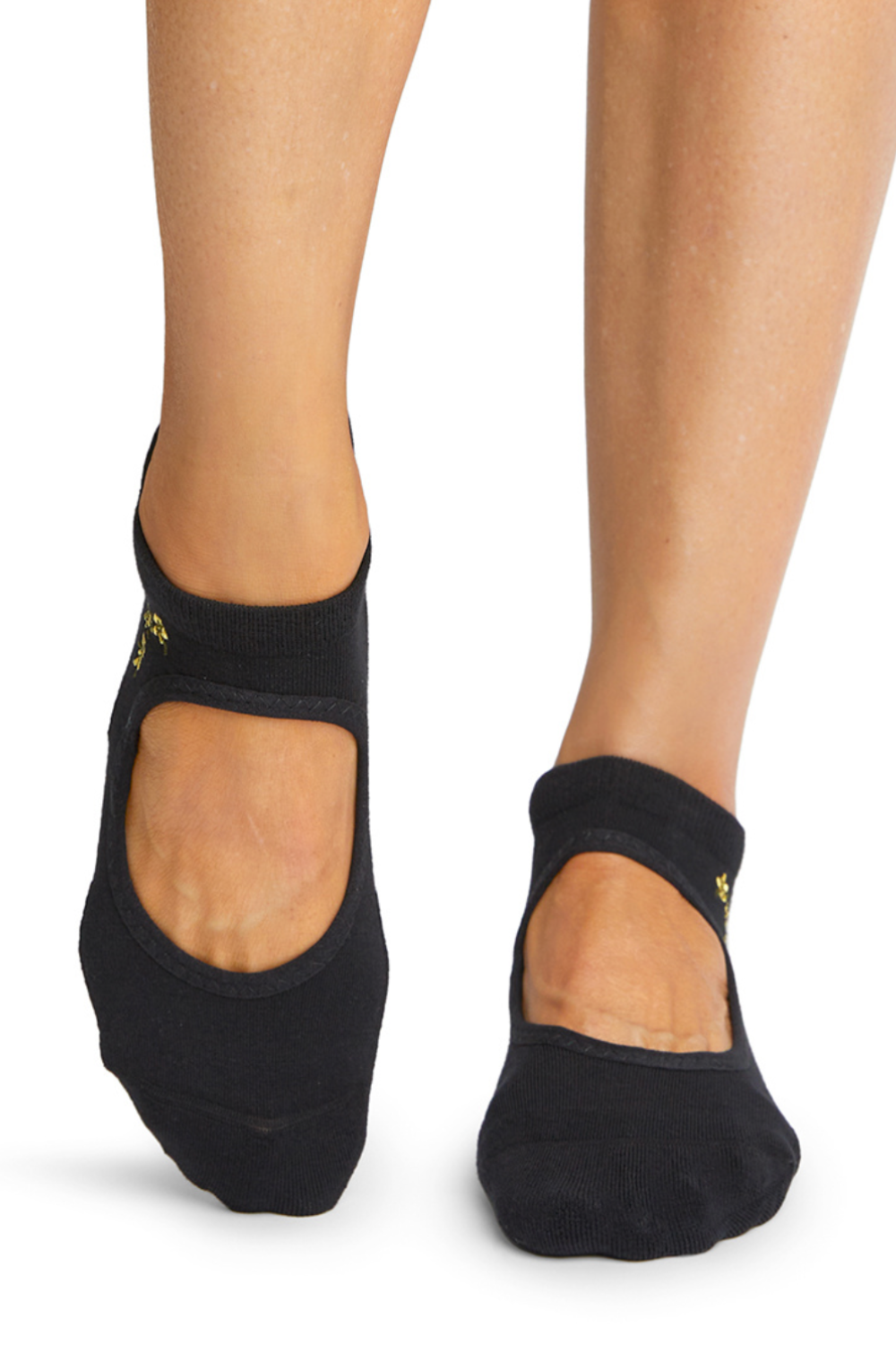 High density black rubber grip activewear socks for yoga, pilates, gym, and exercise from Tavi featured by sustainable women's activewear brand Jilla Active